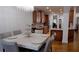 Breakfast area with marble-top table and chandelier at 10785 Arlington Pt, Alpharetta, GA 30022