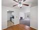 Dining room with chair rail, hardwood flooring, and open to the kitchen and living room at 707 Augusta Se Dr, Marietta, GA 30067