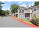 Inviting condo building with a mix of siding and large windows offering natural light at 707 Augusta Se Dr, Marietta, GA 30067