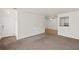 Bright, open living room with fresh paint and large window with kitchen access at 707 Augusta Se Dr, Marietta, GA 30067