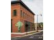 Brick building with apple tree mural at 499 Godfrey Dr, Cumming, GA 30040