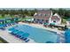 Relaxing resort-style pool with ample lounge chairs and umbrellas at 499 Godfrey Dr, Cumming, GA 30040