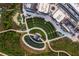 Overhead view of a town square amphitheater and pond at 499 Godfrey Dr, Cumming, GA 30040