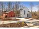 Modern two-story home with attached garage and landscaped yard at 145 Cedarwood Ln, Roswell, GA 30075