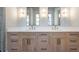 Main bathroom with double vanity, quartz countertop, and frameless shower at 145 Cedarwood Ln, Roswell, GA 30075