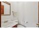 Simple, clean bathroom with white vanity and fixtures at 5622 Williamsburg Dr, Norcross, GA 30093