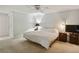 Large bedroom with ample space and ceiling fan at 5622 Williamsburg Dr, Norcross, GA 30093