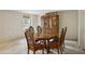 Formal dining room featuring a wood table and hutch at 5622 Williamsburg Dr, Norcross, GA 30093