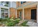 Brick house with a welcoming entrance and well-maintained landscaping at 5622 Williamsburg Dr, Norcross, GA 30093