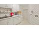 Laundry room with washer, dryer hookups, and storage at 5622 Williamsburg Dr, Norcross, GA 30093
