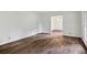 Spacious living room featuring hardwood floors and ample natural light at 5622 Williamsburg Dr, Norcross, GA 30093