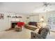 Spacious living room with fireplace and comfy seating at 5622 Williamsburg Dr, Norcross, GA 30093