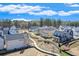 Areal view showcasing sidewalk connectivity between unique neighborhood homes at 929 Hilltop Park Ct, Dacula, GA 30019