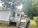Wooden deck, railing, and stairs leading down to the backyard at 115 Montgomery St, Atlanta, GA 30317