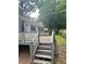 Wooden deck, railing, and stairs leading down to the backyard at 115 Montgomery St, Atlanta, GA 30317