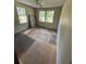 Bedroom with ceiling fan and two windows for natural light at 115 Montgomery St, Atlanta, GA 30317