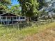 Charming single-story home with a covered porch and a fenced front yard at 115 Montgomery St, Atlanta, GA 30317