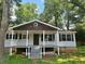 Cozy one-story home with a welcoming front porch, perfect for relaxing outdoors at 115 Montgomery St, Atlanta, GA 30317