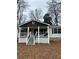 Charming single-story home featuring a quaint front porch with classic architectural details at 115 Montgomery St, Atlanta, GA 30317