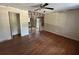 Living room with hardwood floors undergoing renovations, ready for personalization at 115 Montgomery St, Atlanta, GA 30317