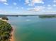 Scenic view of a tranquil lake and shoreline at 765 River Rush Dr, Sugar Hill, GA 30518