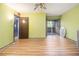 Bright bedroom with laminate flooring, door to balcony, and standard closet at 112 Camelot Dr, Atlanta, GA 30349