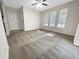 Spacious living room with carpet and an abundance of natural light at 4337 Ben Hill Rd, Atlanta, GA 30349