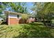 Brick home with a large backyard and deck at 2785 Toney Dr, Decatur, GA 30032