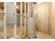 Unfinished basement with water heater and electrical panel at 939 Jean Ct, Covington, GA 30014