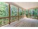 Covered deck overlooking a wooded area at 939 Jean Ct, Covington, GA 30014