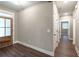 Bright entryway with wood flooring and neutral walls at 939 Jean Ct, Covington, GA 30014