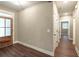 Bright entryway with hardwood floors and a view into hallway at 939 Jean Ct, Covington, GA 30014