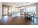 Modern kitchen featuring white cabinets, quartz countertops, and breakfast bar at 939 Jean Ct, Covington, GA 30014