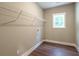 Laundry room with wire shelving and a window at 939 Jean Ct, Covington, GA 30014