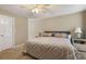 A cozy bedroom with soft lighting, carpet flooring, and comfortable decor at 978 W Mill Bnd, Kennesaw, GA 30152