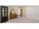 Bedroom featuring neutral tones, carpet, and an elegant wrought iron bed frame at 978 W Mill Bnd, Kennesaw, GA 30152