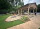 Community pavilion with picnic tables, landscaping and fire pit at 978 W Mill Bnd, Kennesaw, GA 30152