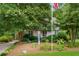 Charming home with mature trees, neat landscaping, and an inviting curb appeal at 978 W Mill Bnd, Kennesaw, GA 30152