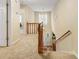 Hallway with staircase, carpet runner, and natural light at 978 W Mill Bnd, Kennesaw, GA 30152