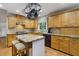 Spacious kitchen with granite countertops, stainless appliances, and hardwood floors at 978 W Mill Bnd, Kennesaw, GA 30152