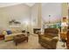Spacious living room features a fireplace, high ceilings, and a bright, airy ambiance at 978 W Mill Bnd, Kennesaw, GA 30152