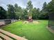 Community playground featuring a slide and climbing structure near the pool at 978 W Mill Bnd, Kennesaw, GA 30152