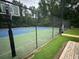 Well-maintained community tennis court with fencing and surrounding greenery at 978 W Mill Bnd, Kennesaw, GA 30152