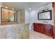 Bathroom featuring a vanity with granite counters, a toilet, and a glass enclosed shower at 3700 Tom Brewer Rd, Loganville, GA 30052