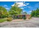 Side yard with stone and brick wall at 3700 Tom Brewer Rd, Loganville, GA 30052