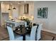 Open-concept dining area featuring modern decor and a stylish table setting for hosting at 507 Godfrey Dr, Cumming, GA 30040