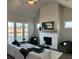 Inviting living room with a fireplace, plenty of seating, and a neutral color palette at 507 Godfrey Dr, Cumming, GA 30040
