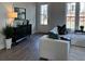 Bright living room featuring modern decor and comfortable seating for relaxing and entertaining guests at 507 Godfrey Dr, Cumming, GA 30040