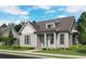 Single story craftsman style home with gray siding, front porch, and landscaping at 503 Godfrey Dr, Cumming, GA 30040