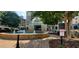 Attractive building entrance with water feature and well maintained landscaping at 795 Hammond Dr # 2007, Atlanta, GA 30328